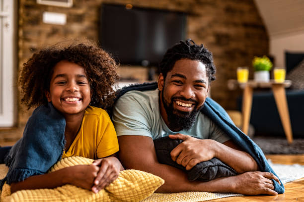 istock Father and daughter looking at camera. 1280984964