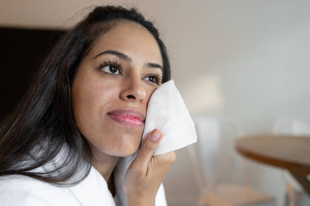 istock Latin woman removing makeup 1280992722