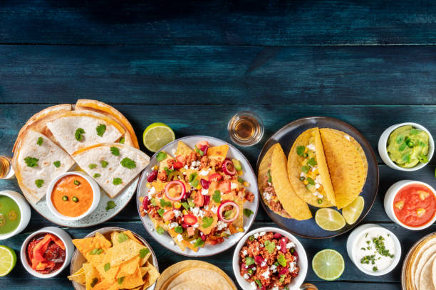 istock Mexican food background with copy space. Many various dishes, overhead shot 1280994101