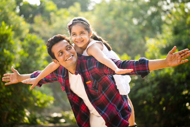 istock Father and daughter enjoying piggyback ride 1280996593