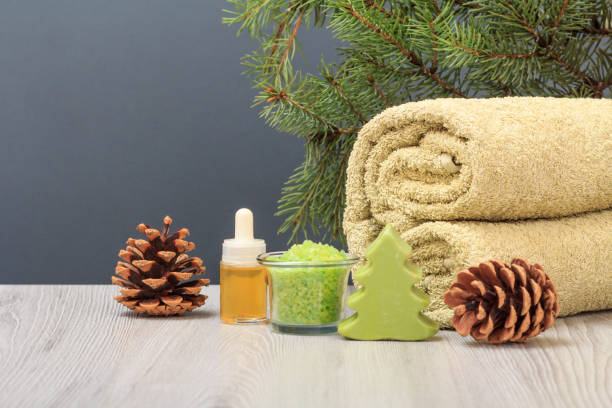 istock Spa composition with soft terry towel and spa products on wooden boards 1280997933