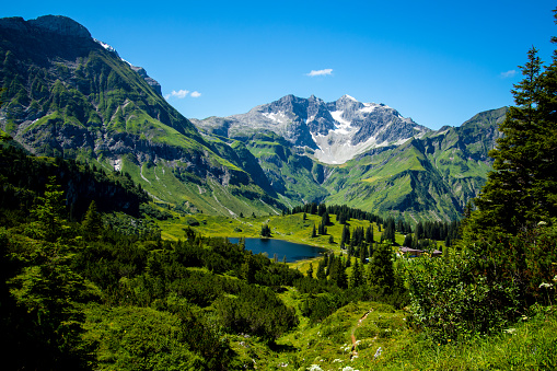 Sunny morning view of western slope of Tre Cime di Lavaredo mpountain peaks. Colorful summer scene of Dolomiti Alps, South Tyrol, Italy, Europe. Beauty of nature concept background.