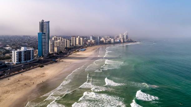 istock Aerial view over beach at sunset 1281000629