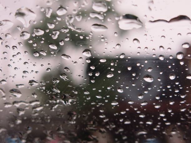 istock Abstract water droplets Stuck on glass for background 1281006925