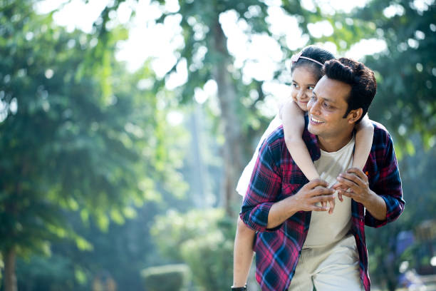 istock Father and daughter enjoying piggyback ride 1281009466