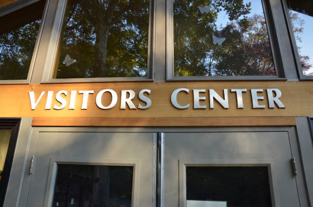 visitors center sign with doors and windows