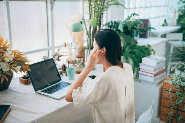istock Asian woman working at home 1281014416