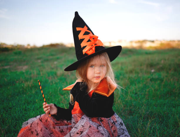 istock little girl dressed as a witch celebrates halloween 1281014799