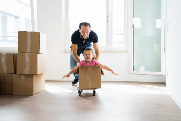 istock Happy People Moving Into New House 1281014977