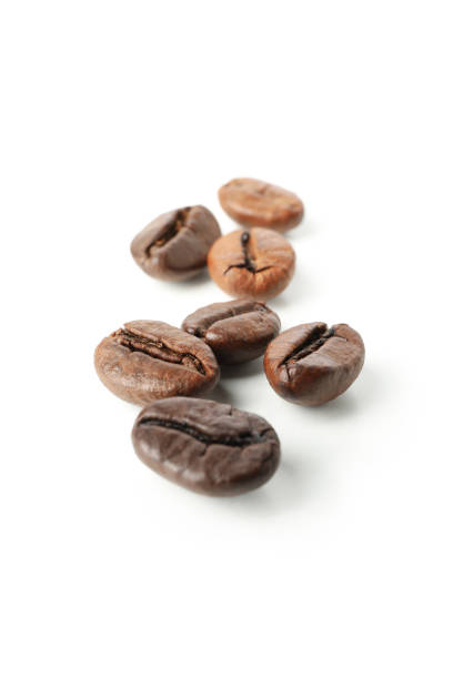 istock Fresh coffee seeds isolated on white background 1281016534