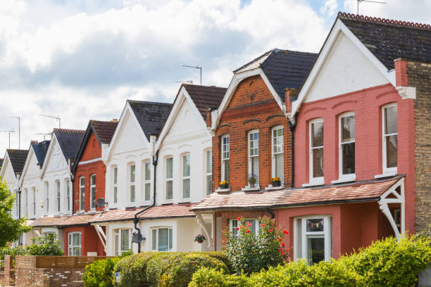 Traditional English terraced houses in Crouch End, London Row of traditional English terraced houses in Crouch End, north London window chimney london england residential district stock pictures, royalty-free photos & images