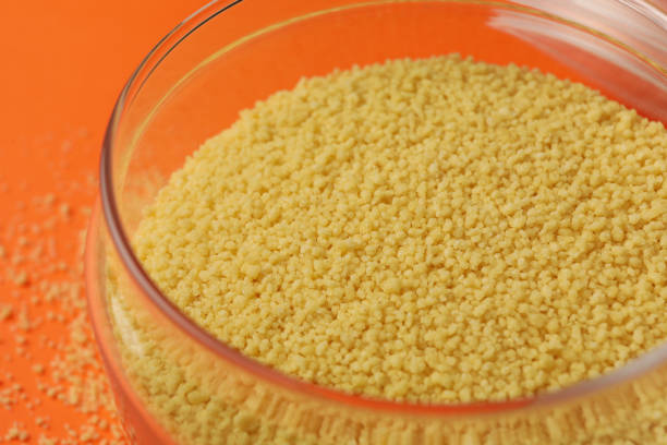 istock Glass jar with couscous on orange background 1281019433