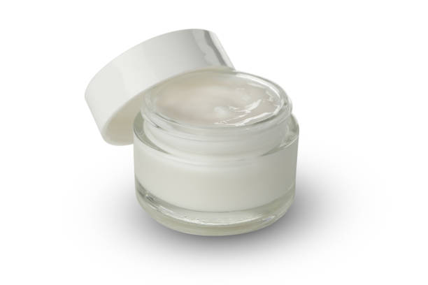 istock Cosmetic cream in jar isolated on white background 1281022261