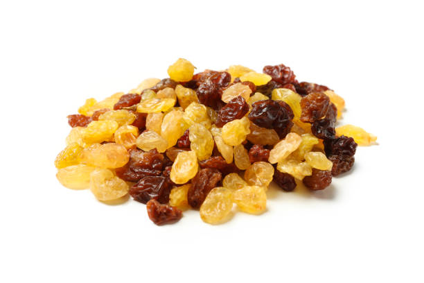 istock Bunch of raisins isolated on white background 1281025840