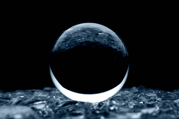 istock Abstract glass ball in blue. A crystal ball with blurry pattern. Glass bal in blur. 1281026149