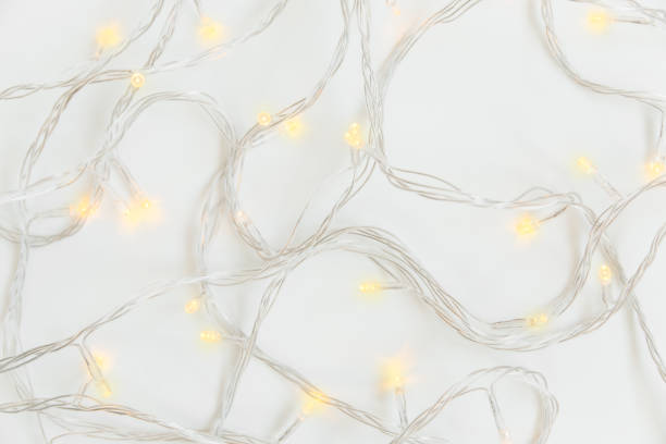 istock Christmas light garland. White background. Top view. Close-up 1281028568