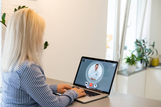 istock woman use Laptop. Student Researching Process Work. Young Business Woman Working Creative Startup modern Office. Analyze market stock, new strategy. 1281028872