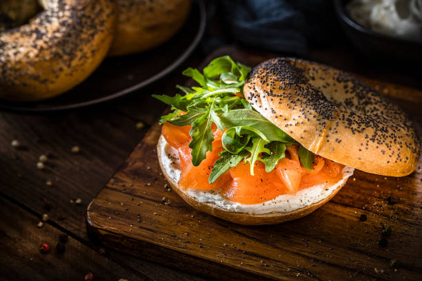 istock Poppy seed bagel with cheese cream, smoked salmon and arugula 1281029651