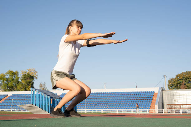istock Young woman making warm up on the stadium 1281032819
