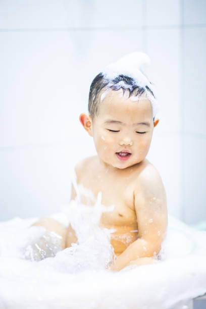 istock Baby Boys playing water when bathing 1281033909