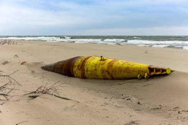 istock sea buoy made of iron, old iron float on the shore 1281034094