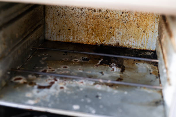 istock dirty oven, electric oven in fat 1281034267
