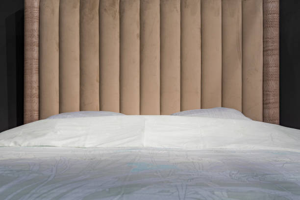 istock Beautiful modern bedroom interior. Made up bed. 1281034531