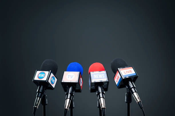 istock Set of microphones ready for the press conference 1281038702