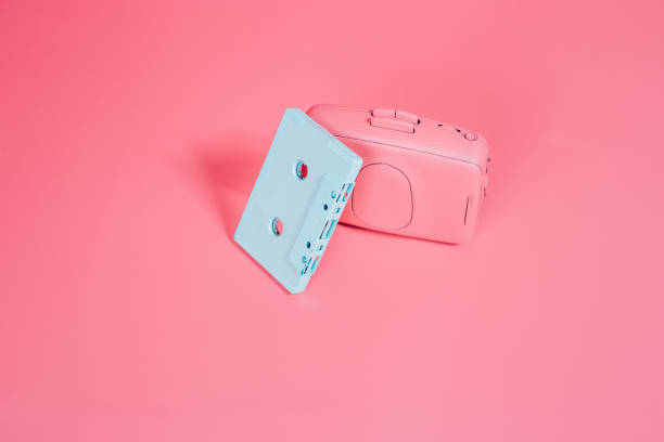 istock Pink cassette player on pink background 1281039673