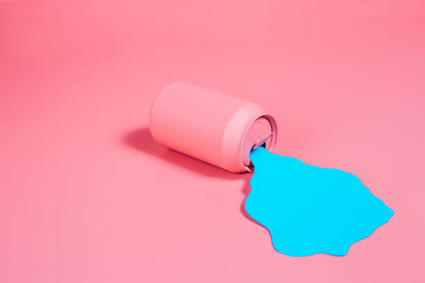 Water spilled on pink background