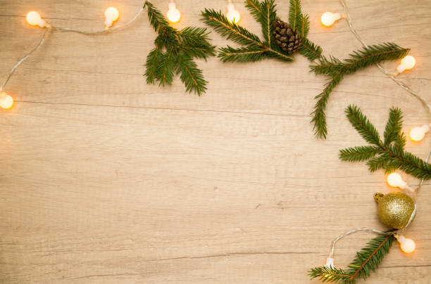 istock Christmas composition with fir branches and garlands. Flashlights. Flat lay. Frame. 1281043841