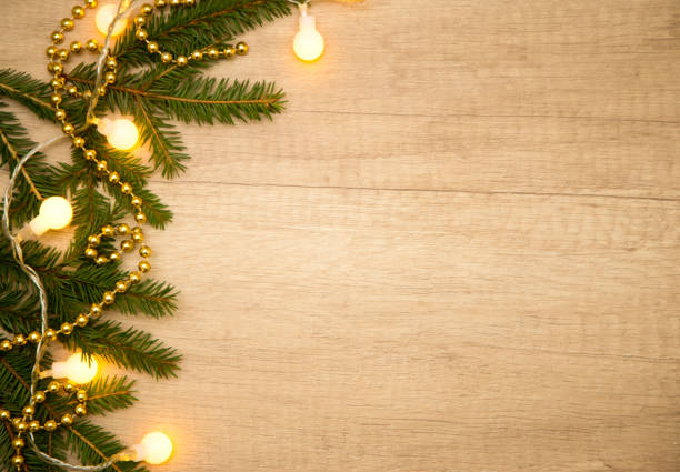 istock Christmas composition with fir branches and garlands. Flashlights. Flat lay. Frame. 1281043922