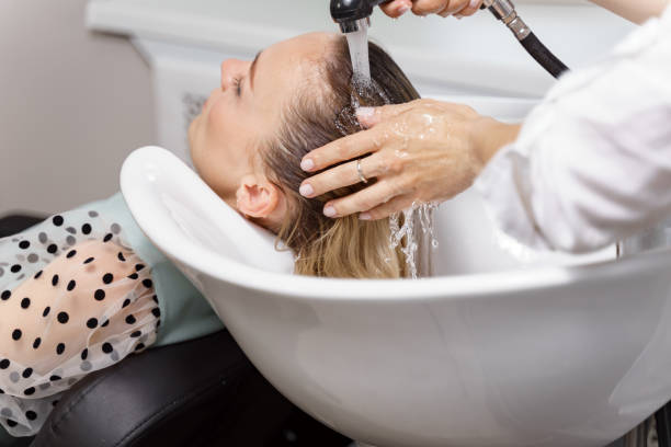 istock shampooing in the beauty salon 1281046150