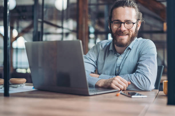 istock Portrait of a smiling young businessman 1281046449