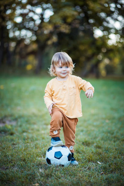istock Fun with football ball. 1281053211