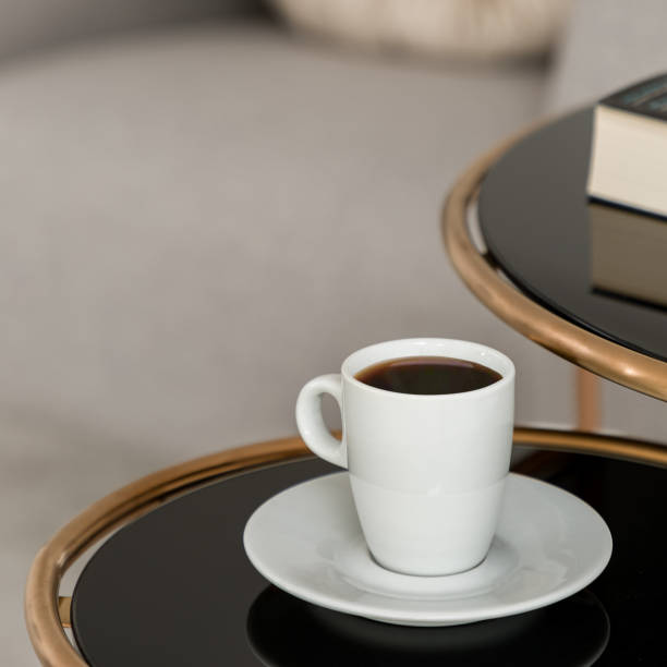 istock Cup of coffee on stylish table, close-up 1281054538