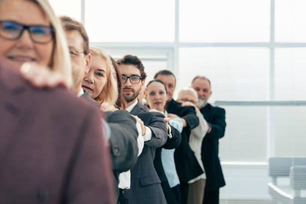 istock close up. diverse business people standing in line 1281055530