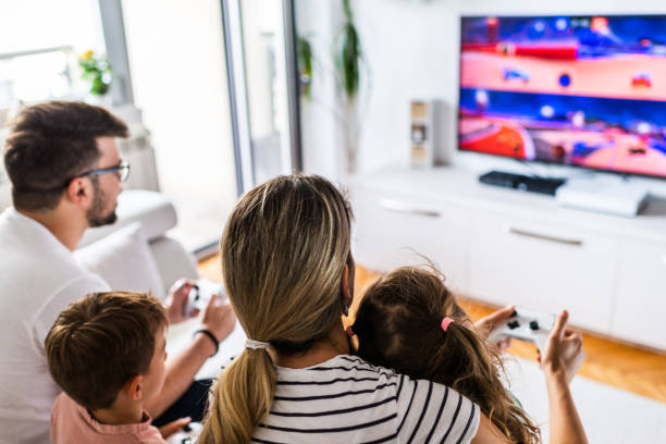 istock Family playing video games 1281056644