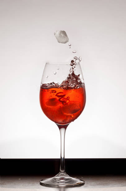 Red water Still life, red water and ice cube bicchiere stock pictures, royalty-free photos & images