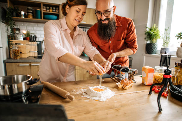 istock Couple enjoying cooking and vlogging 1281057696