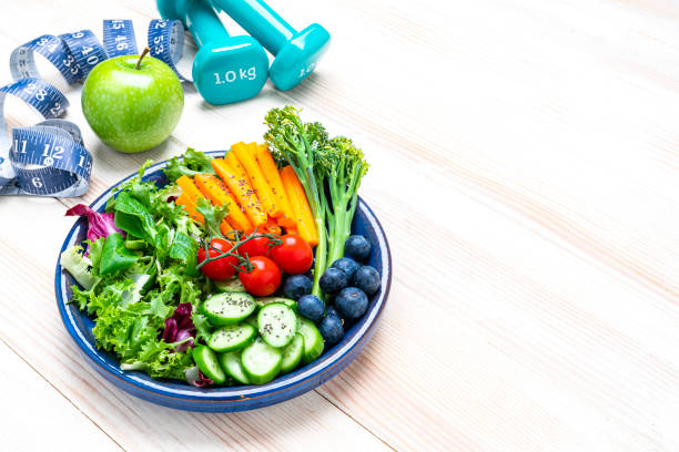 istock Vegan salad and exercising for better health 1281059075