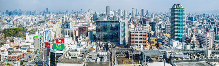 Aerial panoramic view over the crowded cityscape of central Osaka, Japan.