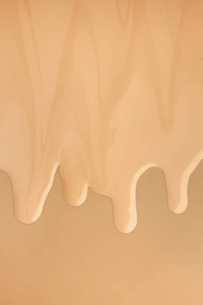 istock Smudged make-up gradient chocolate brown beige texture palette creamy matte concealer foundation CC or BB-cream powder 1281059569