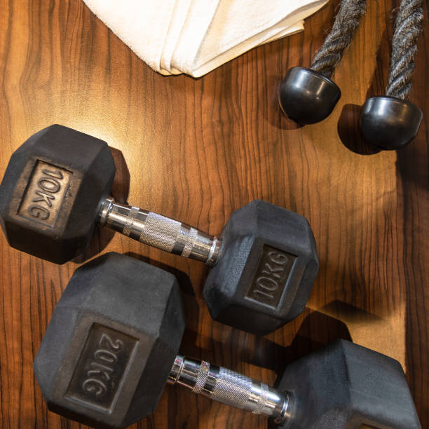 istock Dumbbell barbell towel top view 1281060735