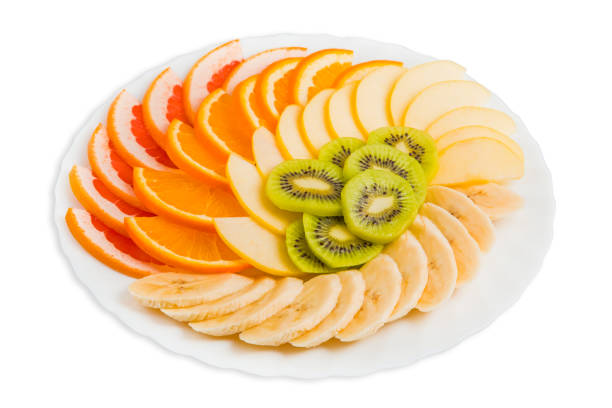 Mixed fruit in white plate isolated on white background - Healthy food style.