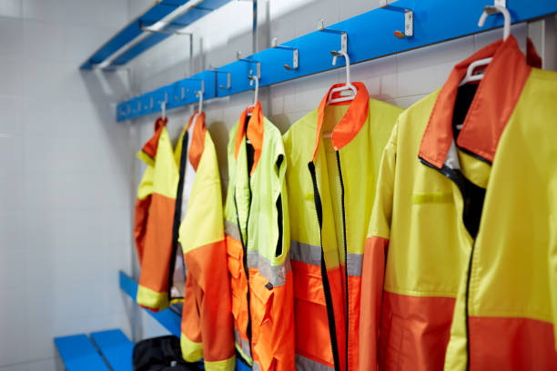 istock Protective clothing on a rack at the locker room 1281063411