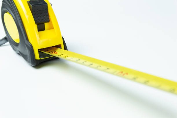istock Tape measure isolated on white background. 1281067378