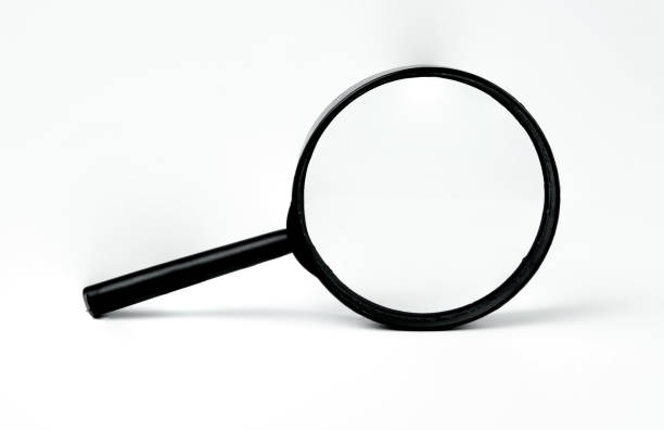 istock Magnifying glass isolated on white background. 1281068590