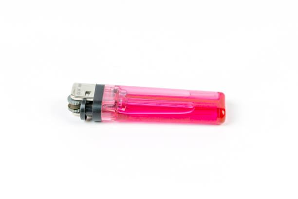 istock Red plastic gas lighter, Gas lighter on white background. 1281068666