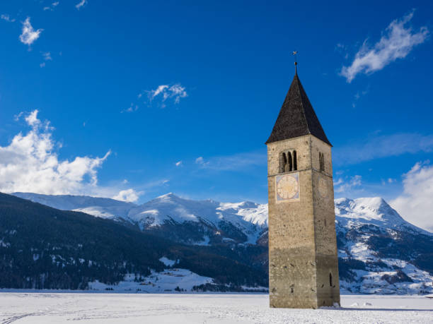 istock Winter at Lake Reschen in Italy 1281072357
